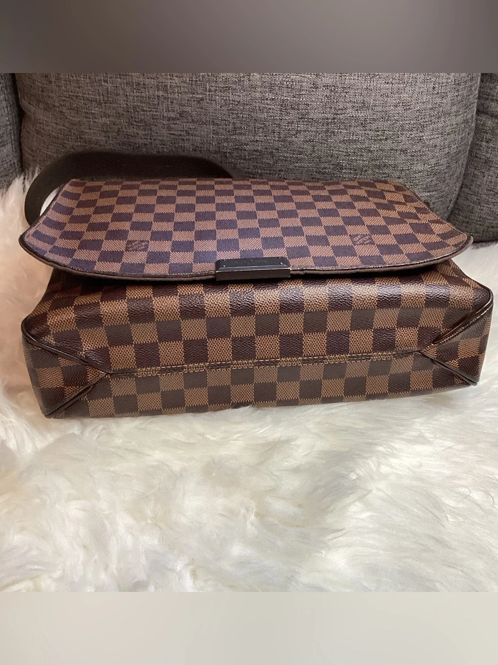 Louis Vuitton Damier Ebene District MM messenger bag.